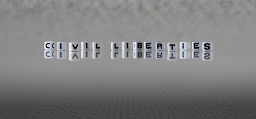 civil liberties word or concept represented by black and white letter cubes on a grey horizon...
