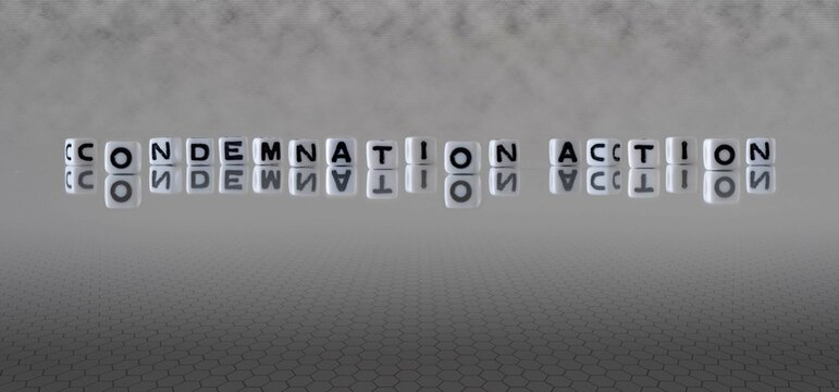 condemnation action word or concept represented by black and white letter cubes on a grey horizon background stretching to infinity