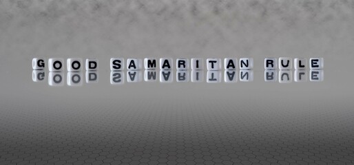 good samaritan rule word or concept represented by black and white letter cubes on a grey horizon...