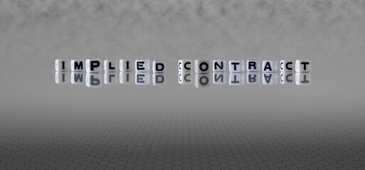 implied contract word or concept represented by black and white letter cubes on a grey horizon background stretching to infinity