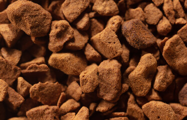 Instant coffee granules as background.