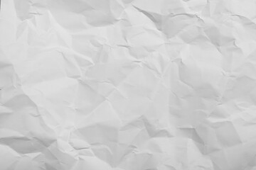 Sheet of white crumpled paper as background, closeup