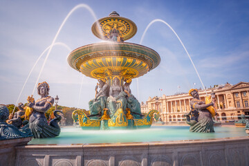 Fountain in Place de la concorde with blurred water, Paris, France - obrazy, fototapety, plakaty