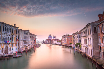Fototapeta na wymiar Grand Canal of Venice with blurred movement at sunrise, Italy