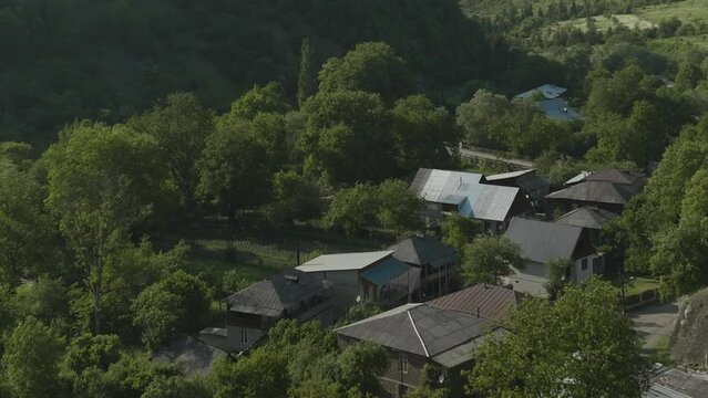 Idyllic Township Of Surami (Daba) In Shida Kartli Region, Georgia. Aerial Pullback Shot