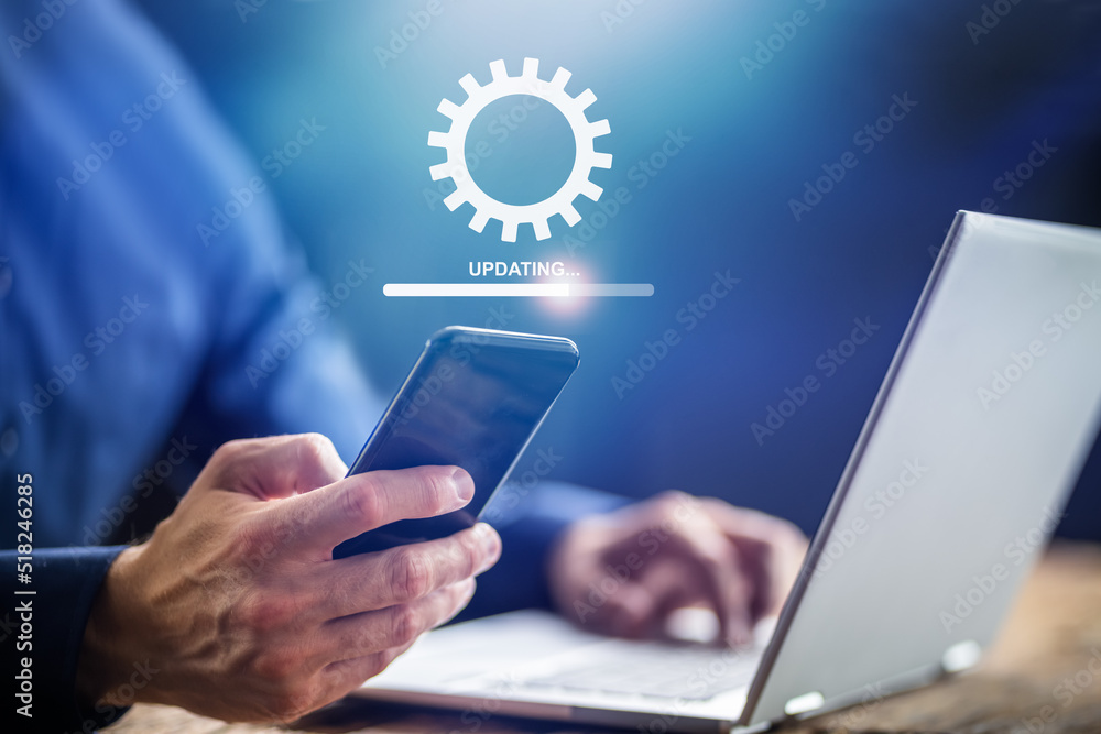 Poster man doing software update on mobile phone