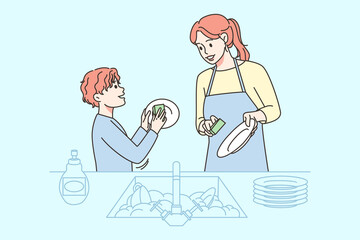 Smiling kid helping mom with dishes 