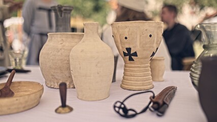 Reenactment richly decorated table from event about medieval celebration and wedding daughter rich buyer. Celebration contains huge feast.