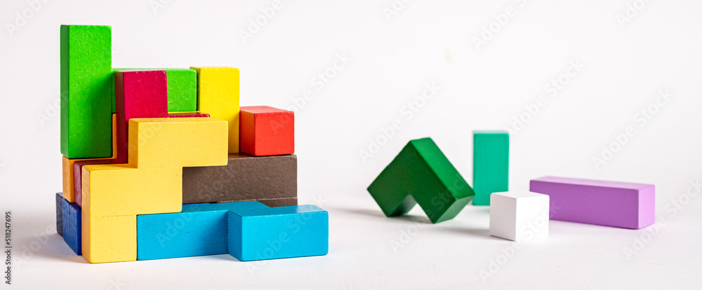 Poster puzzle toy with geometric blocks of bright colors. assembling concept. logical thinking, creativity 