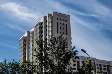 Obraz premium urban landscape with high-rise buildings and a panoramic view of the city on a summer day taken from a drone