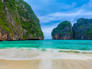 Maya bay beach with no people and waves in a paraside Phi Phi Le island
