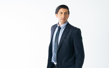 Portrait handsome smart Caucasian male businessman wearing formal suit, posing with success and confidence, standing on isolated white background cutout.