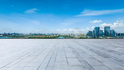 Panoramic skyline and modern buildings with empty floor in Suzhou, China.