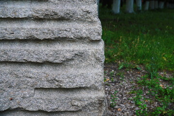 splitted granite boulder rock. Splitting with drilling holes and typing wedges. Used in building industry, stonemasonry