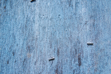 Blue old plank texture with stains and nails, vintage blue wood background, copy space