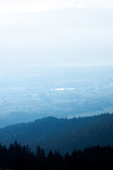 view from Gurnigel towards Thun and Lake Thun in bright morning light