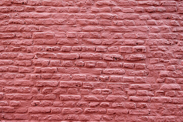 Old red brickwall freshly painted for art background with copy and text space