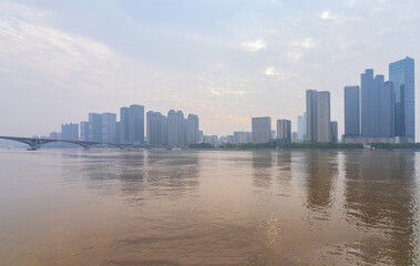 Naklejka premium The city skyline, the Yangtze River Bridge and the scenery of the Yangtze River in Changsha, Hunan Province, China