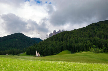 Alpine church in Ranui, Santa Maddalena, Val di Funes, Trentino Alto Adidge, Dolomites, Italy