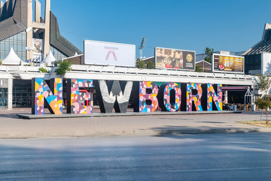 Pristina, Kosovo - June 5, 2022: Newborn Monument (NEWBORN). Typographic sculpture and tourist attraction.