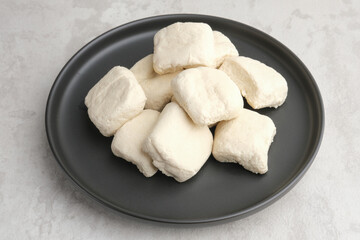 Tahu Putih or Tofu, one of raw ingredient food made from fermented soybean extract. 
