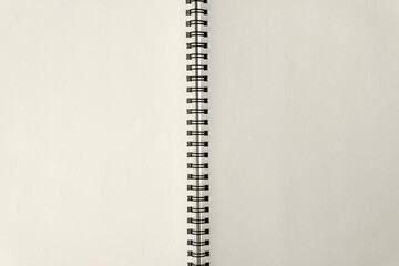 Top view above Open spiral notebook craft paper made from natural material and blank white page texture and minimal style background, page for take notes things to do