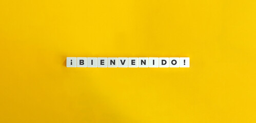 Bienvenido (Welcome) in Spanish Banner. Letter Tiles on Yellow Background. Minimal Aesthetics.