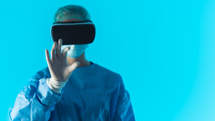 Doctor with virtual reality headset - medium studio shot closeup blue background . High quality...