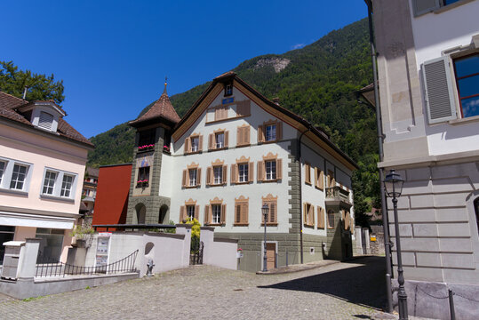 Town Hall Square at City of Altdorf, Canton Uri, with historic houses on a sunny summer day. Photo taken June 25th, 2022, Altdorf, Switzerland.
