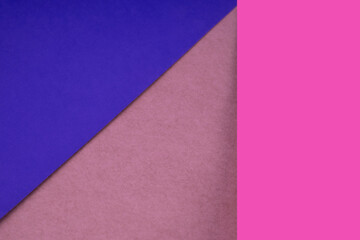 Textured and plain blue purple peach pink sheet papers forming two triangles and vertical blank rectangle for creative cover designing