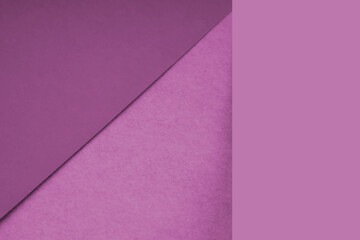 Textured and plain pink sheet papers forming two triangles and vertical blank rectangle for creative cover designing