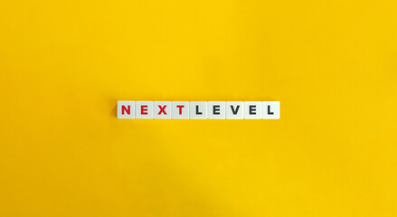 Next Level Banner. Letter Tiles on Yellow Background. Minimal Aesthetics.