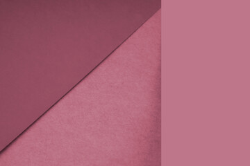 Textured and plain peach pink sheet papers forming two triangles and vertical blank rectangle for creative cover designing