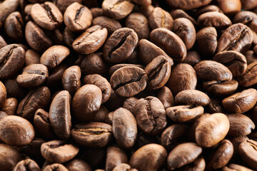 Roasted coffee beans macro close up background