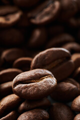 Roasted coffee beans macro close up background
