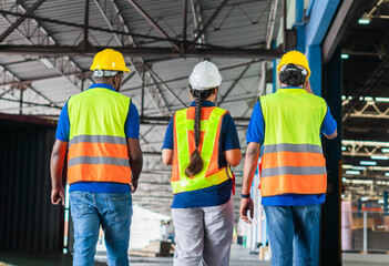 Manager and supervisor taking inventory in warehouse, Foreperson making plans with warehousemen, Workers team working in warehouse