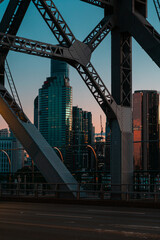 Story bridge with backdrop of Brisbane city