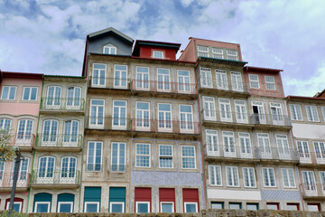 Faded vintage buildings of downtown district in Porto, Portugal. Classical portuguese architecture