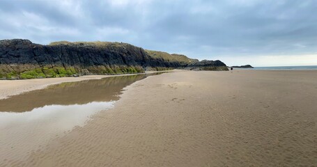 looking out to sea from the rocks and beach