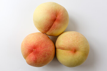 white peach on a white background