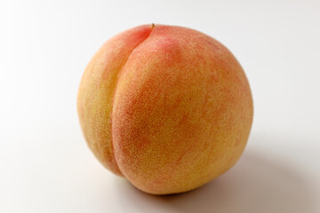 white peach on a white background