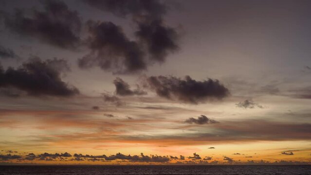 SERIES Red orange sunset sky orange video 4k cloud Red orange cloudscape time lapse background Dark red purple sunset sky cloud time lapse 4k evening clouds moving away rolling Phuket Thailnad.