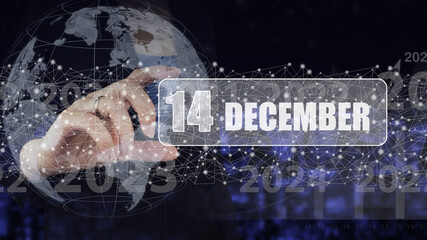 December 14th. Day 14 of month, Calendar date. Hand hold virtual screen card with calendar date.  Winter month, day of the year concept.