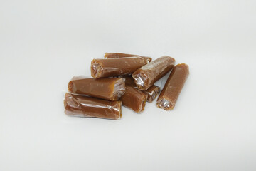 Dodol is a traditional snack from Indonesia with a sweet taste. Isolated on a white background