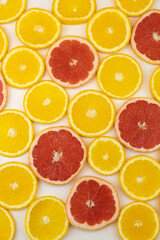 Fresh organic orange slices on surface
