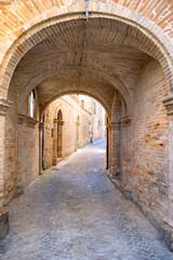 Fototapeta na wymiar Medieval archway in Italy