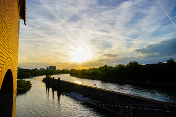 View of the Neckar and Heidelberg from the Wehrsteg Wieblingen. Weir on the Neckar. Pedestrian and...