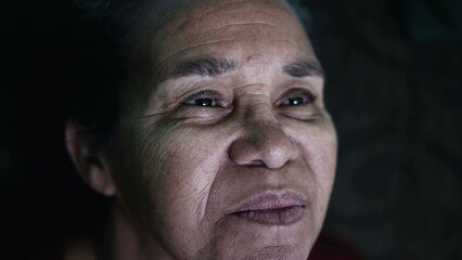 One older hispanic black woman portrait face closeup. A senior South American elder