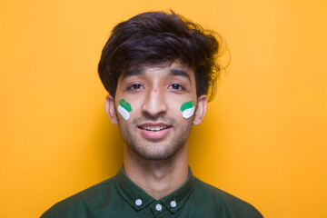 Young Man holding Pakistan Flag, river side, 14th august, Independence Day