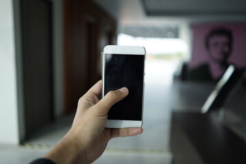 mobile phone concept holding to take picture, black screen